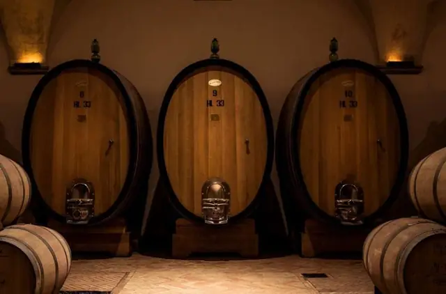 Large wooden wine casks in a Montalcino cellar