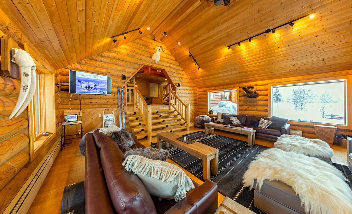 Timber lodge lounge overlooking the Alaskan wilderness